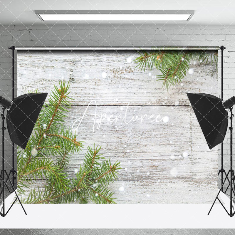 Aperturee - Aperturee Pine Leaf Snowy Beige Wood Grain Christmas Backdrop