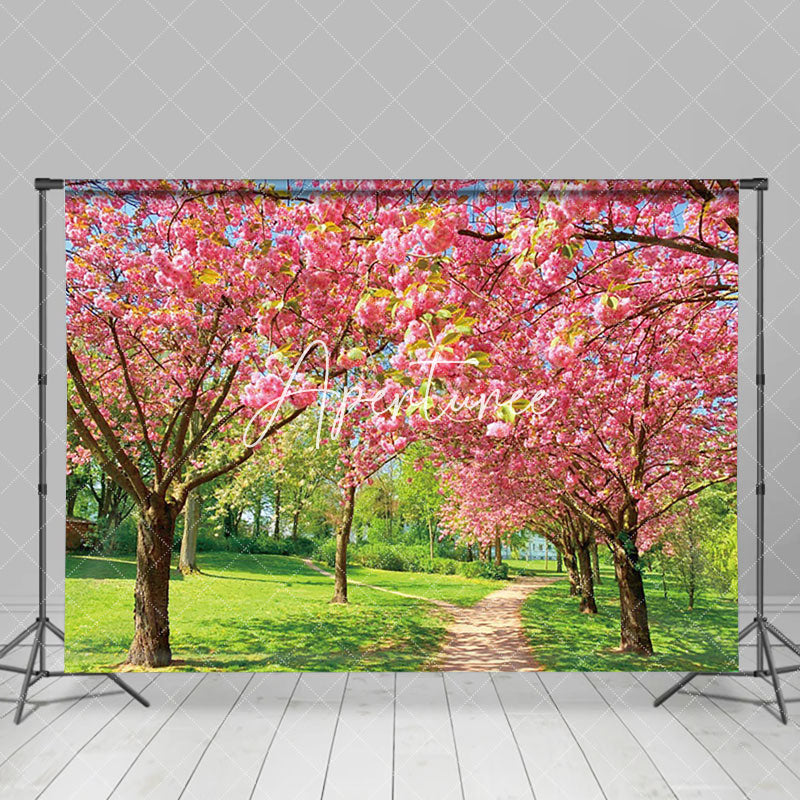 Aperturee - Aperturee Tranquil Pink Sakura Forest Path Spring Backdrop