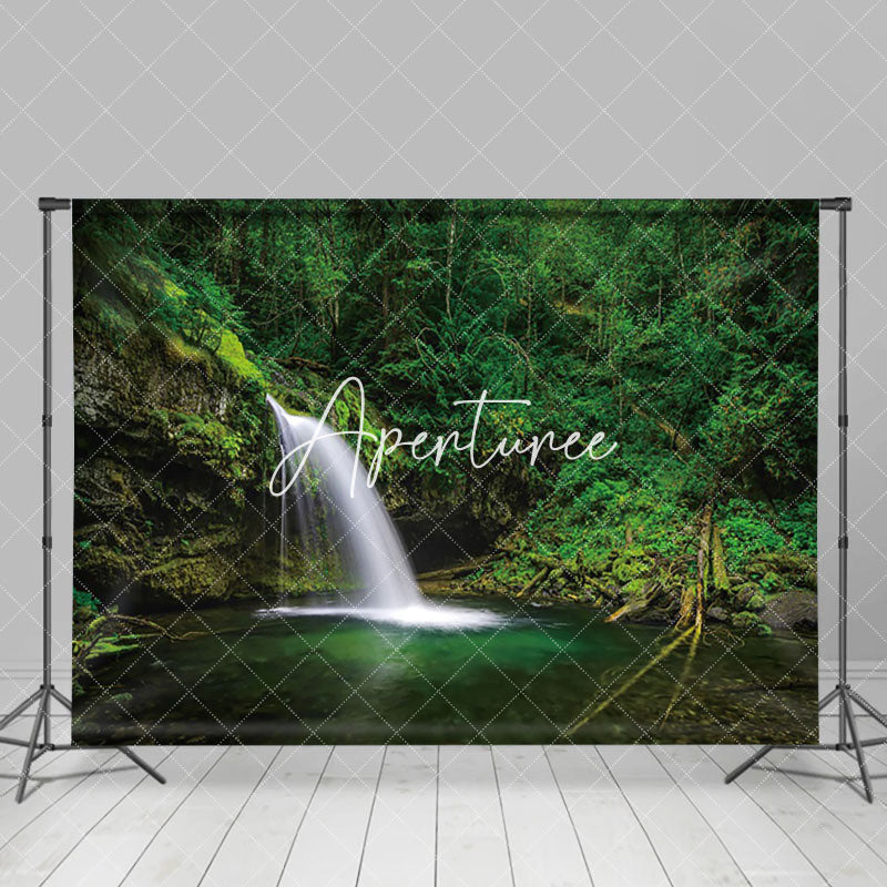 Aperturee - Aperturee Waterfalls Vibrant Vegetation Clear Water Backdrop