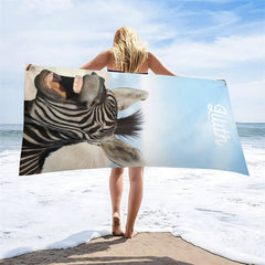 Aperturee - Laughing Zebra Sand Bokeh Blue Sky Custom Beach Towel