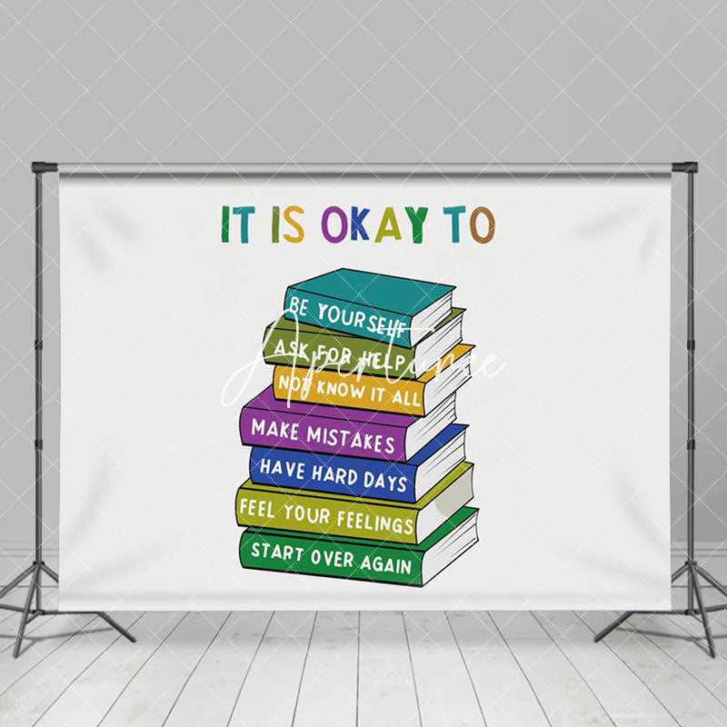 Aperturee - Stacked Books It Is Okay To Positive Slogan Backdrop