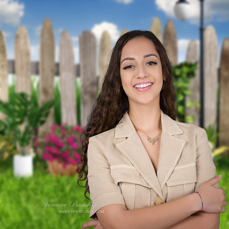 Aperturee - Wooden Fence Flowers Grass Blue Sky Spring Photo Backdrop