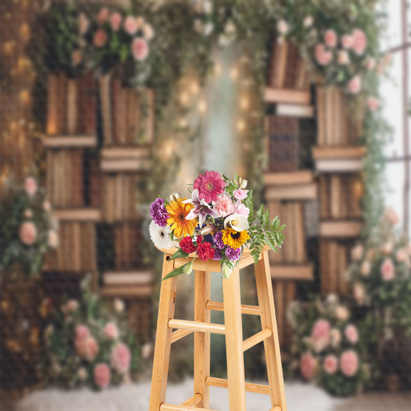 Aperturee - Bookcase Surrounded By Flowers Spring Photo Backdrop